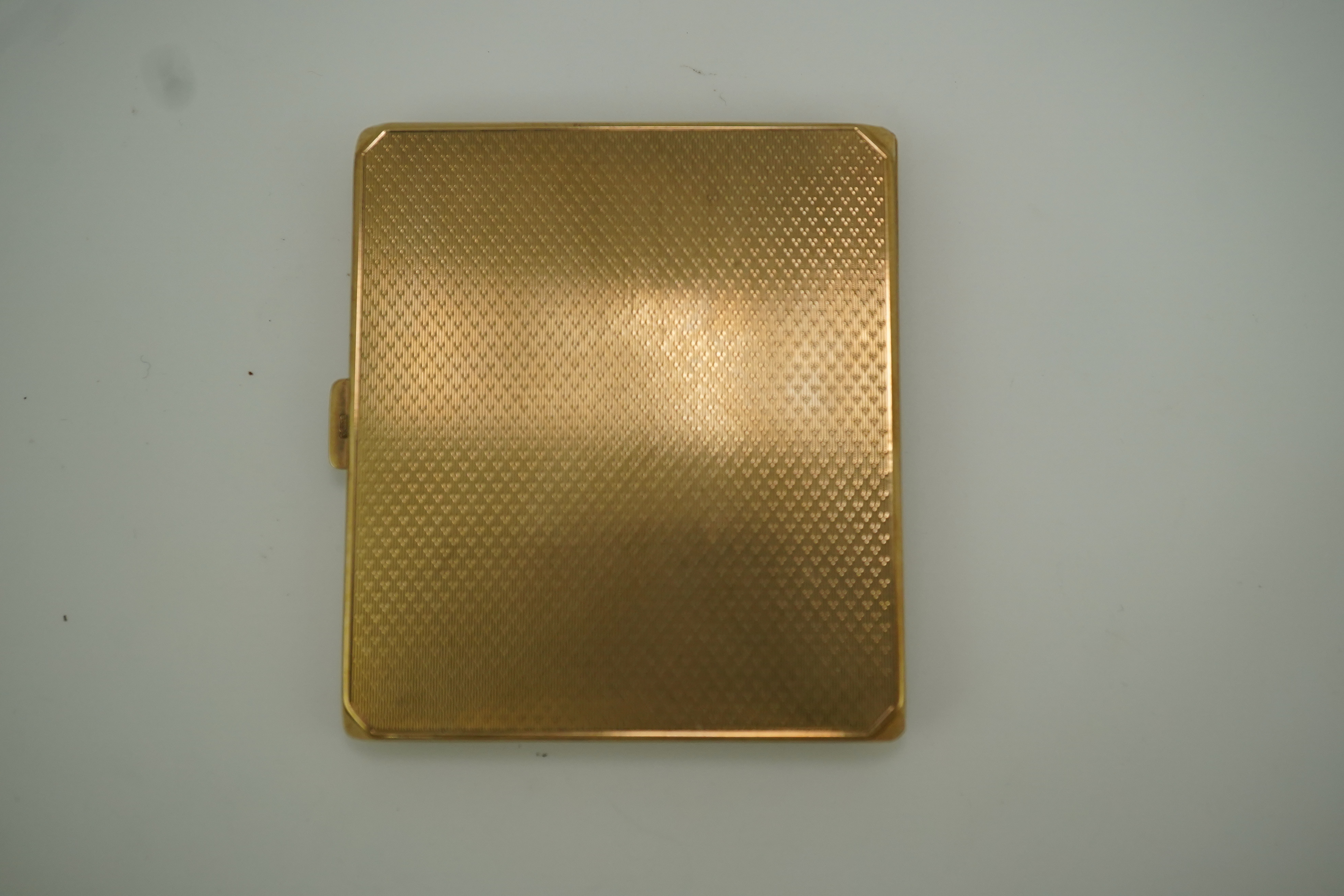 A 9ct gold cigarette case, circa 1930